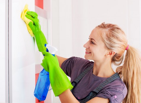 House clearance team handling furniture removal in a Docklands apartment building