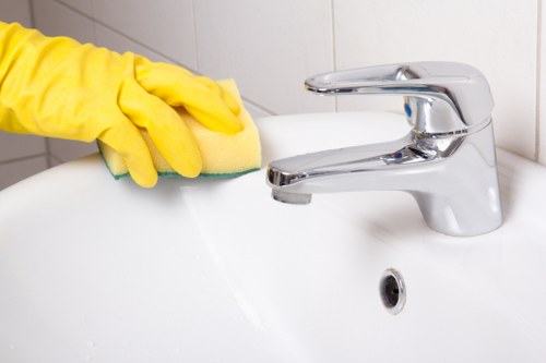 Kitchen and bathroom cleaning during an Airbnb reset in Docklands