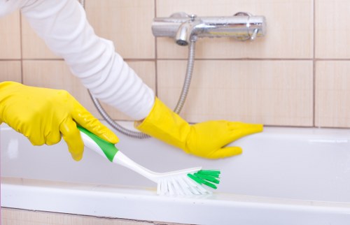 Office cleaning team working in a modern Docklands commercial workspace